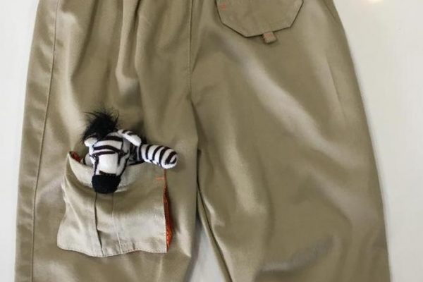 Pants with zebra in pocket